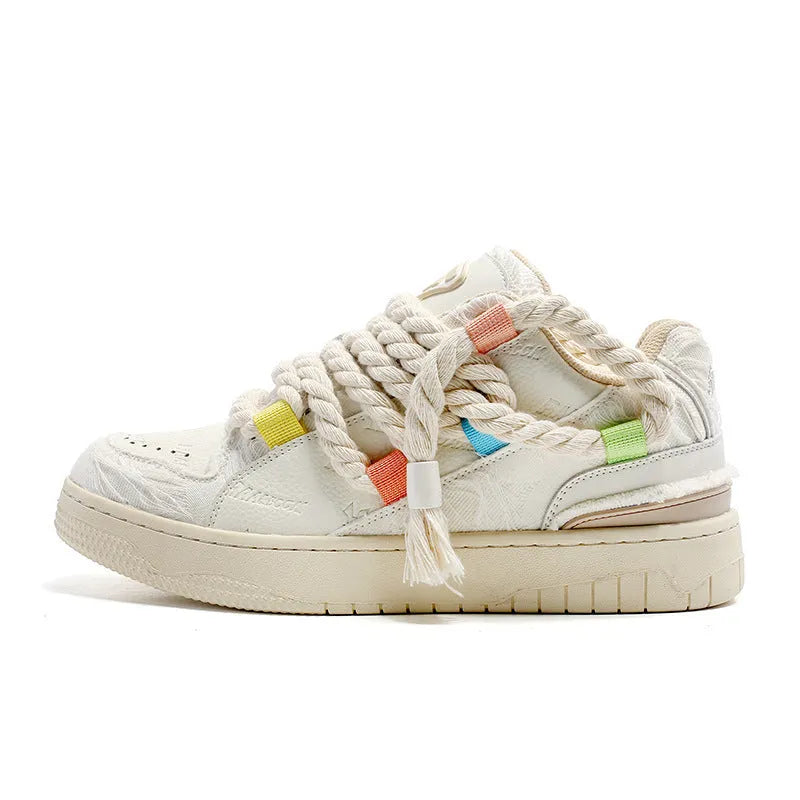 Creamy white retro low-top skate shoes with platform heel and round toe