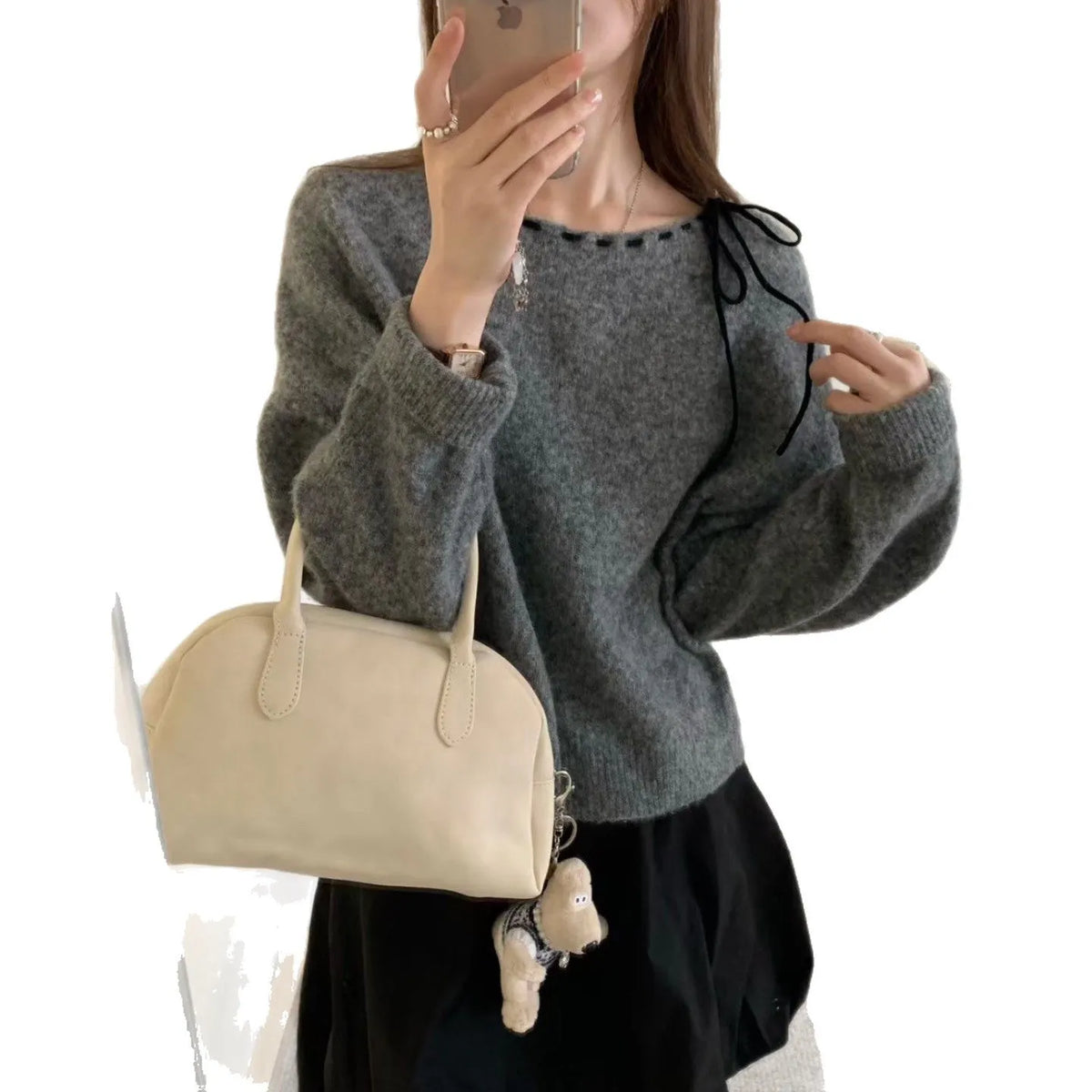 Women's grey loose-fitting pullover knitwear with relaxed sleeves and crew neck