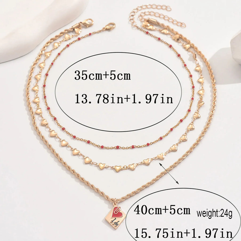 Adjustable three-layer clavicle chain necklace with geometric heart pendant in zinc alloy