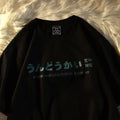 Loose fit short sleeve cotton T-shirt in dark grey on a hanger.