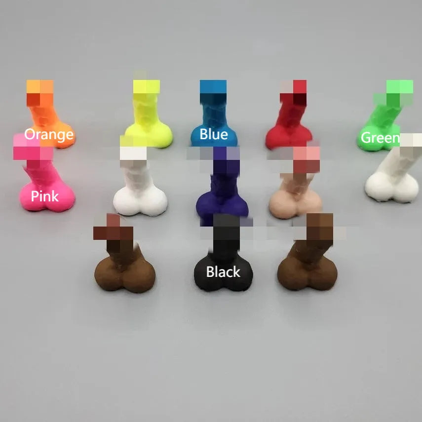 Set of five rubber tyre valve stem caps in pink, black, green, blue, and orange colours