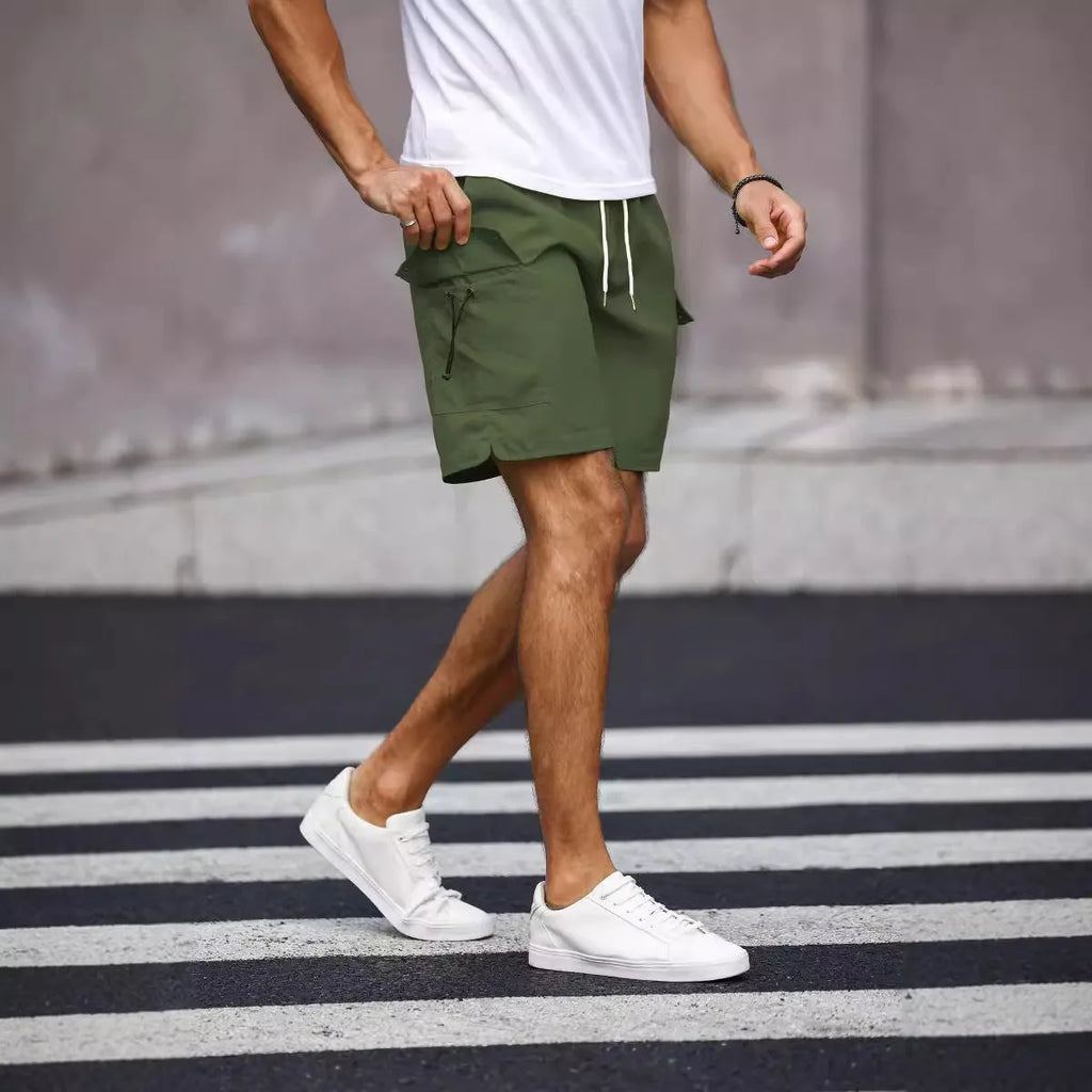 Men's loose straight-leg workwear shorts in fluorescent green or army green colours with micro-elastic polyester blend fabric