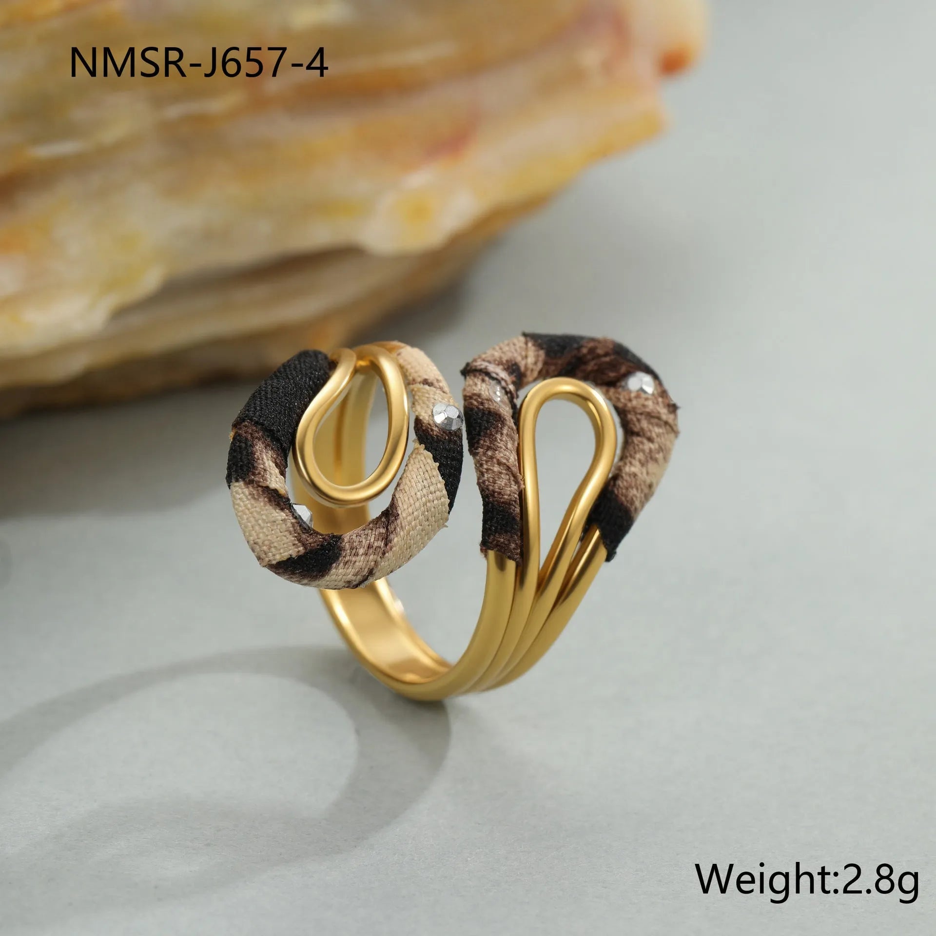 Stainless steel open mouth ring with leopard print geometric shapes in multiple colour options