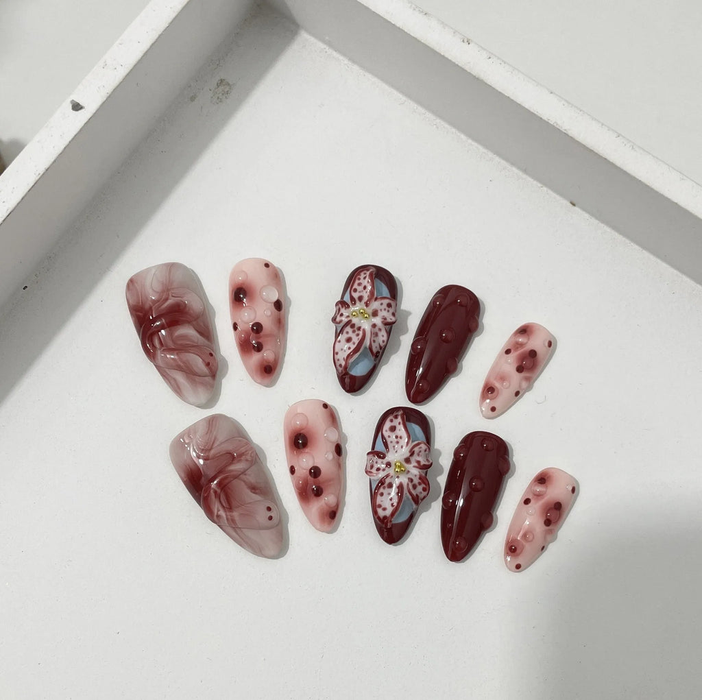 Medium length hand-painted manicure nails with blooming flower 3D carving design in almond colour