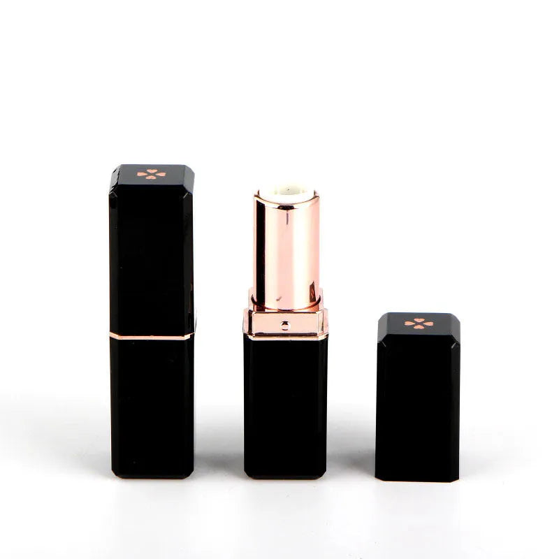 Empty 121 caliber lipstick tube in black, pink, red, or white ABS plastic for DIY cosmetics.