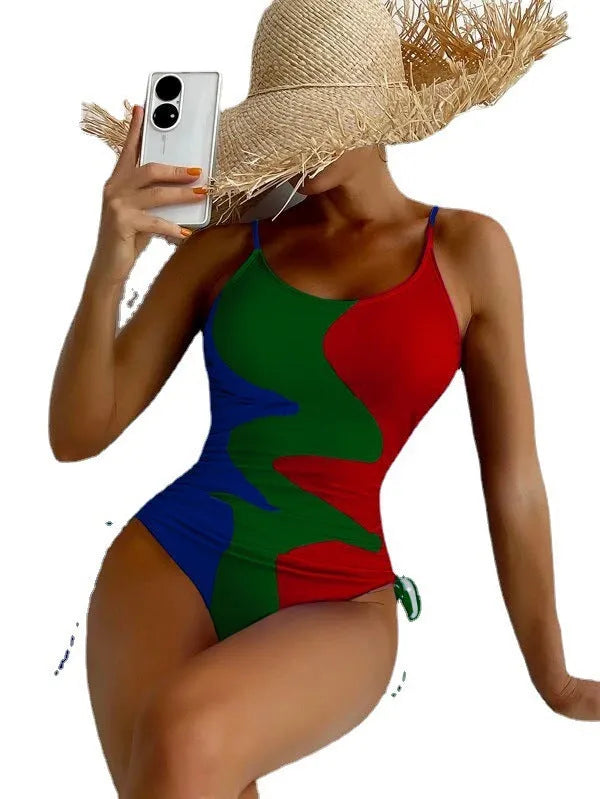 Women's blue one-piece swimsuit with sleeveless design and fixed swimming trunks