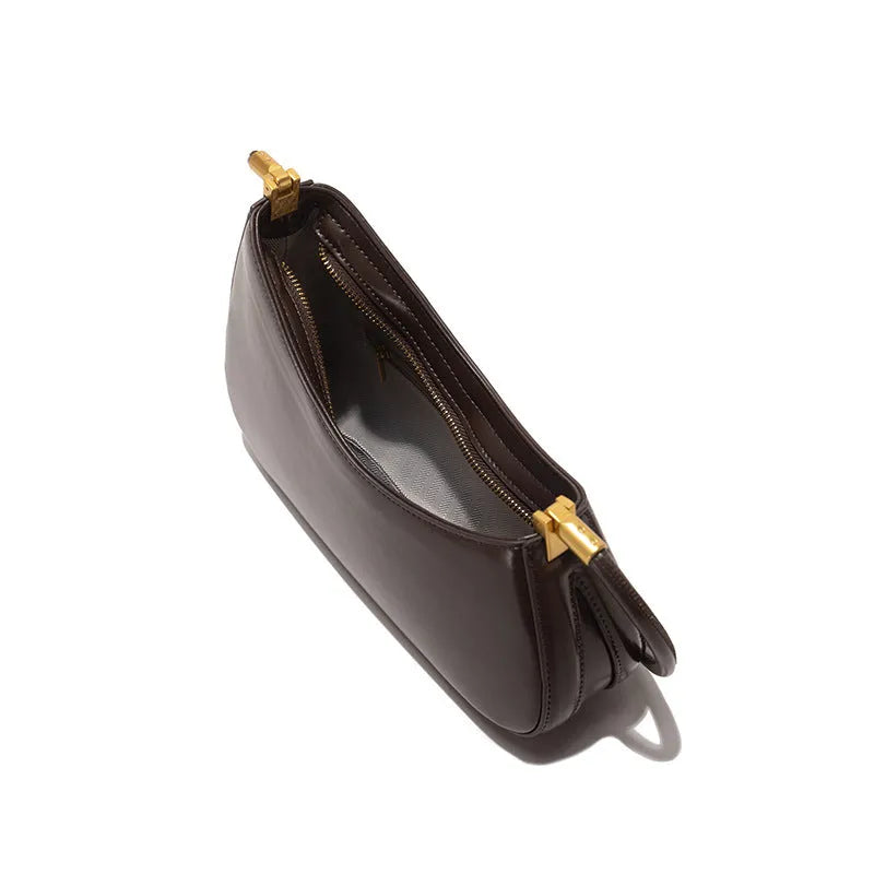 Brown PU leather oval underarm bag with single shoulder strap and sandwich pocket design