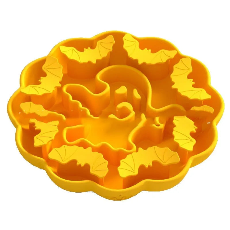 Edible silicon anti-choke slow feeding dog bowl in Halloween orange colour on floor