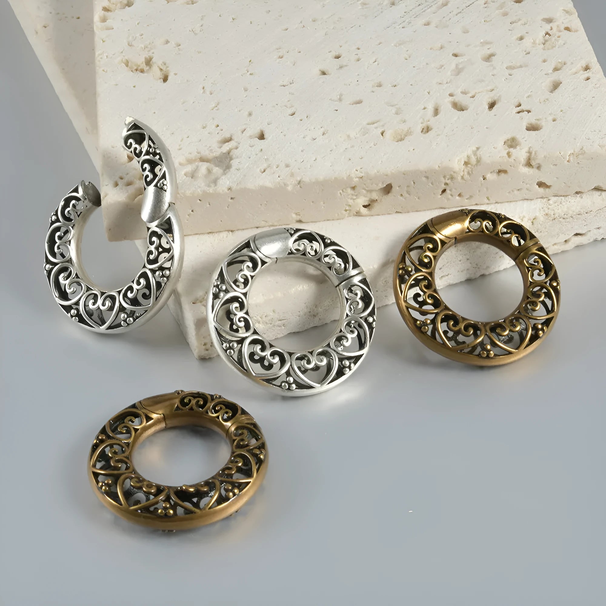 Retro heart-shaped hollow lotus magnetic earrings in antique silver stainless steel
