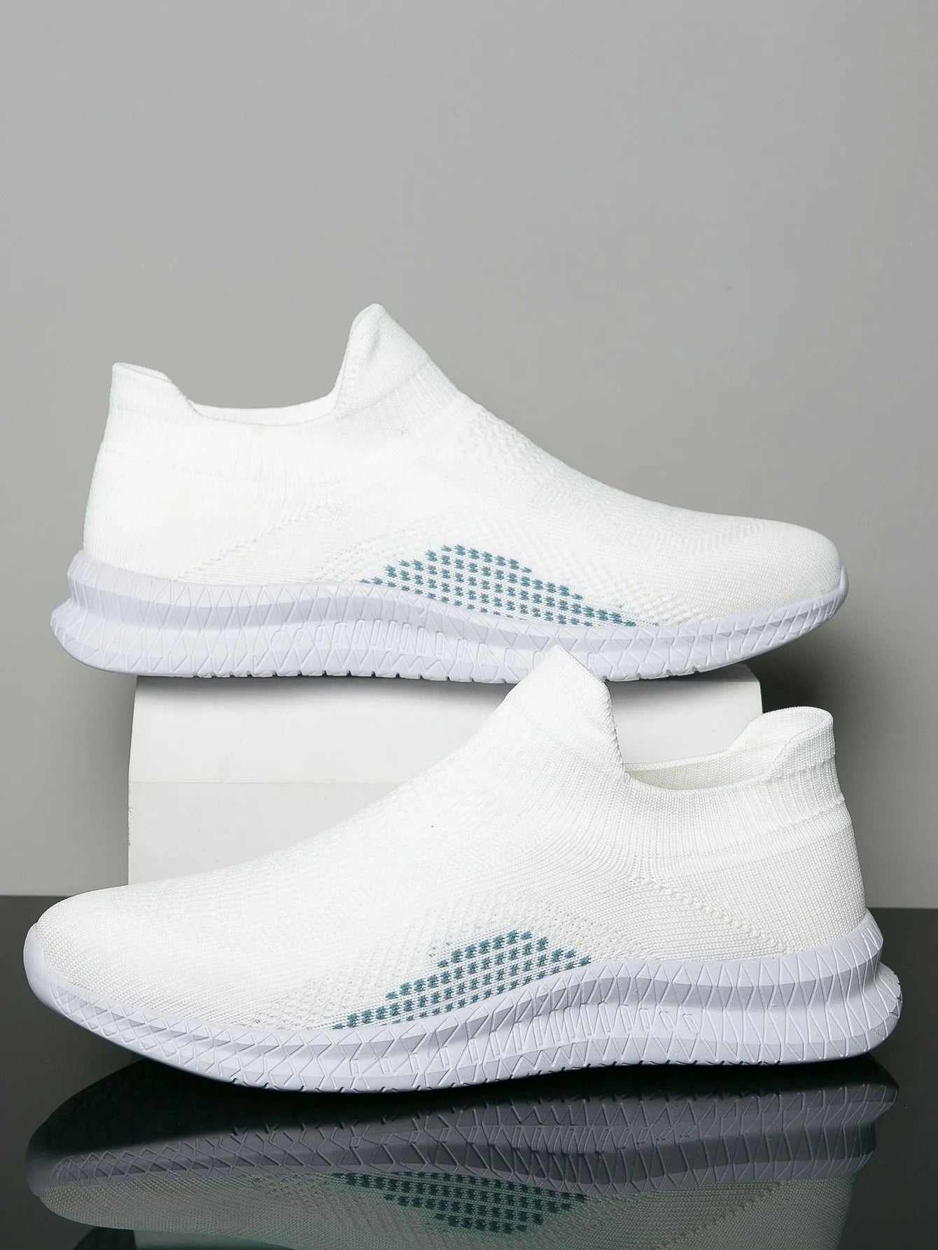 Men's low-top Flyknit popcorn stitch casual sneaker in blue, shown from the side.