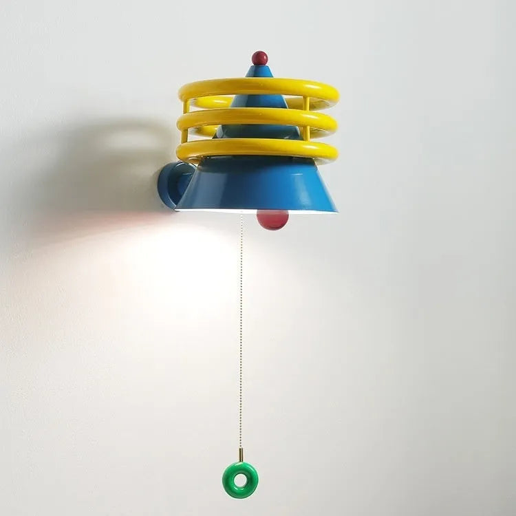 French cream wind belt bedhead wall light 25cm diameter with warm light option on bedroom wall
