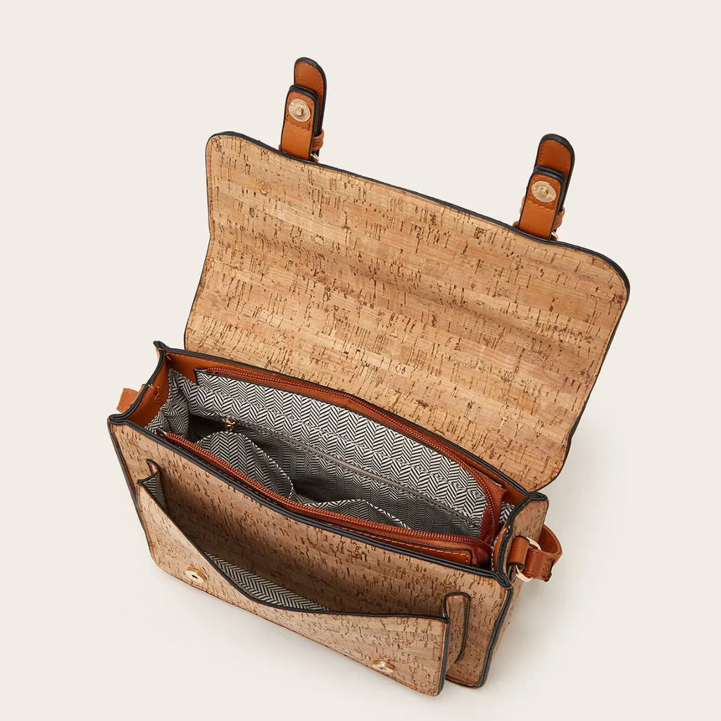 Women's printed PU shoulder bag with adjustable strap shown in four colour variations
