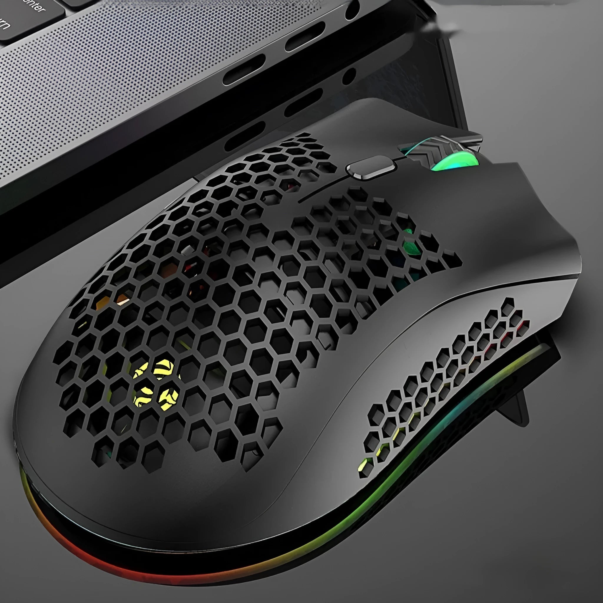 Hollow out wireless gaming mouse with RGB lighting in black, cyan, and white colour options