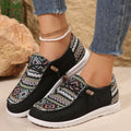 Women's black low-top flat shoes with round toe and artificial PU upper