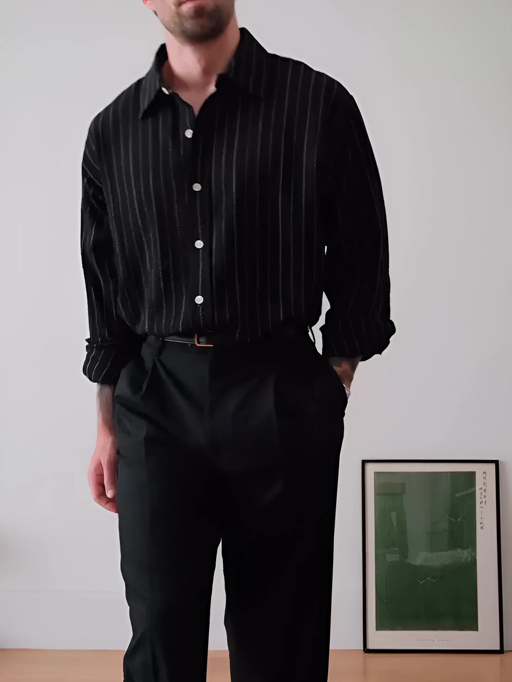 Black pinstriped button-down shirt with regular fit and traditional collar on mannequin