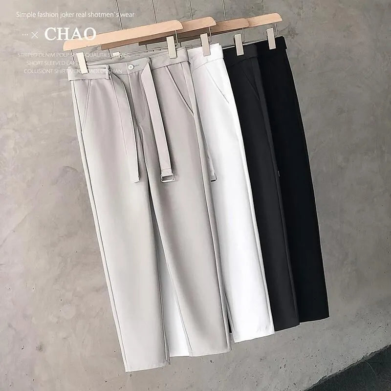 Boys slim straight wool trousers in a tapered cut with a straight leg opening.