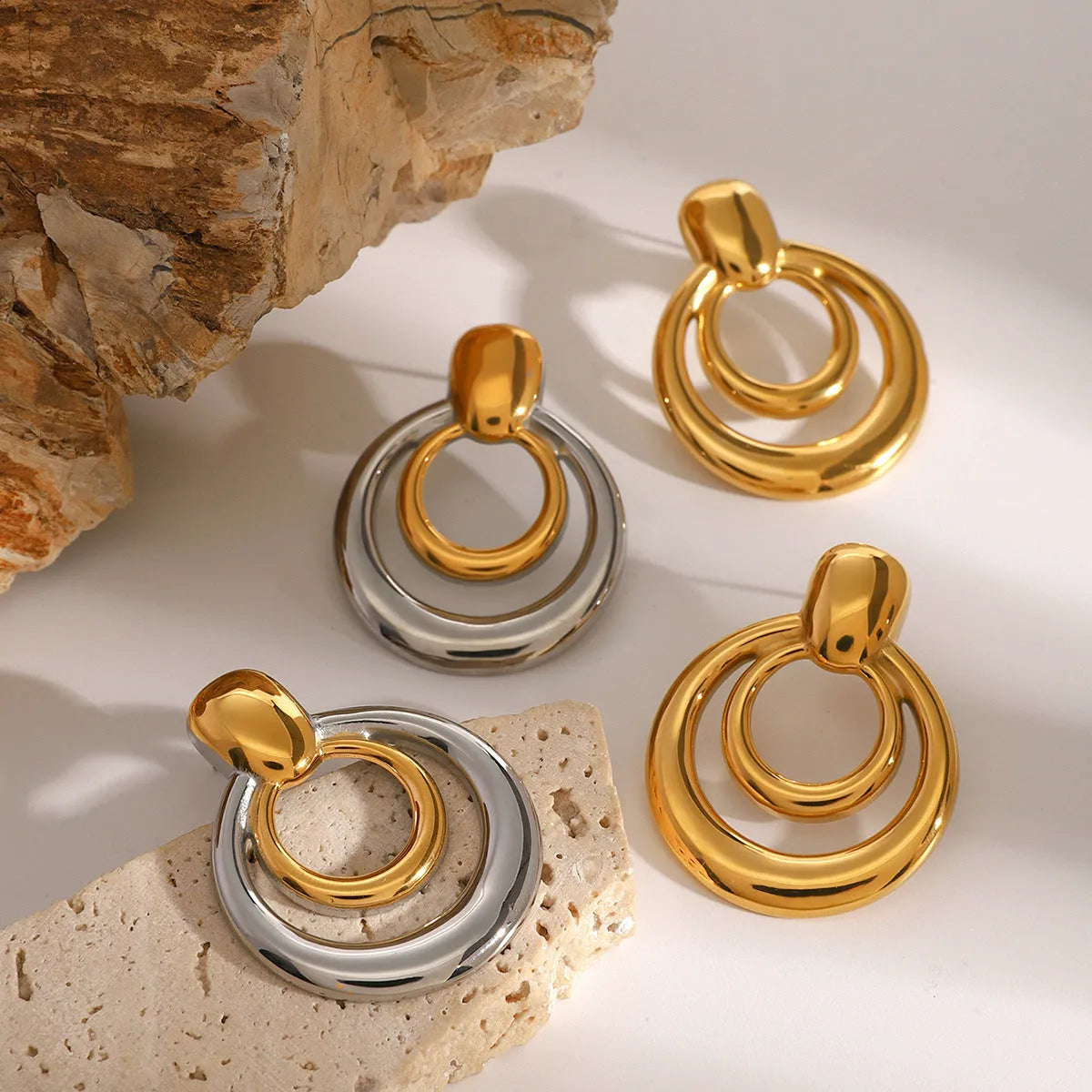 Golden round geometric stud earrings with double layer hollow design on titanium steel