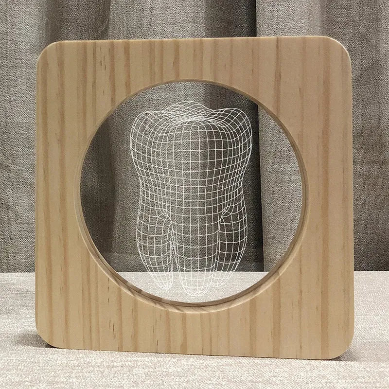 Tooth-shaped wood colour acrylic night lamp with USB cable on white background