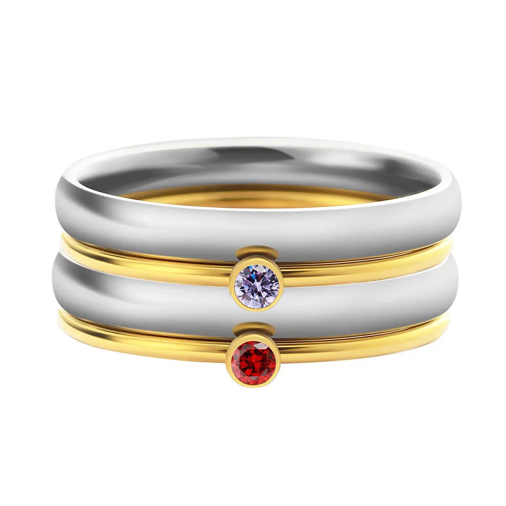 Geometric stacking ring for women with December birthstone colour and gold electroplated finish.