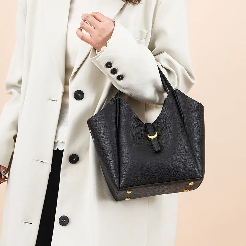 Genuine leather women's bucket handbag in retro style with large capacity and internal file organisation