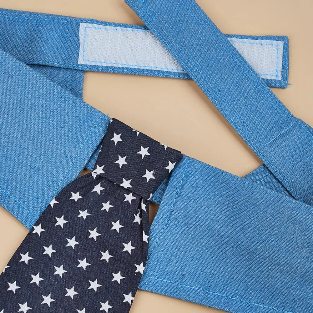 Denim dog collar with star pattern and attached bow accessory on adjustable fastener tape