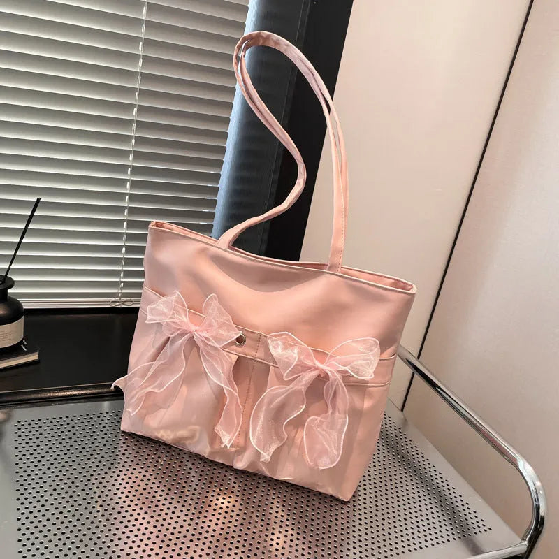 College style bow tote bag with double shoulder straps and large capacity interior