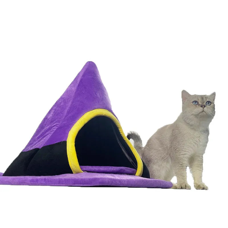 Purple Halloween witch hat shaped cloth cat nest bed measuring 60cm by 45cm.