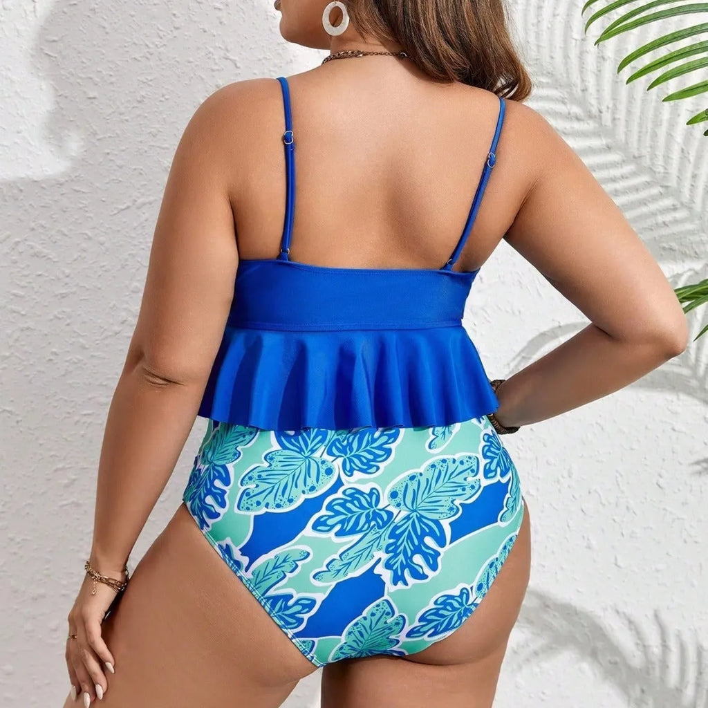 Blue plus size women's bikini set with brief shorts, shown on a mannequin.