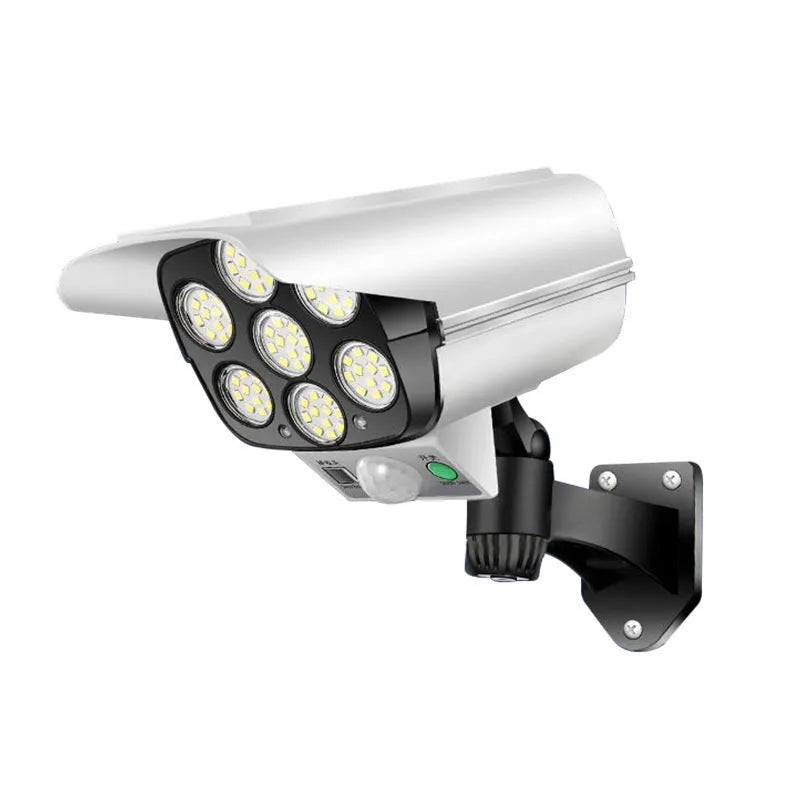 A modern, abstract-shaped solar-powered security light with LEDs, designed for outdoor wall mounting.