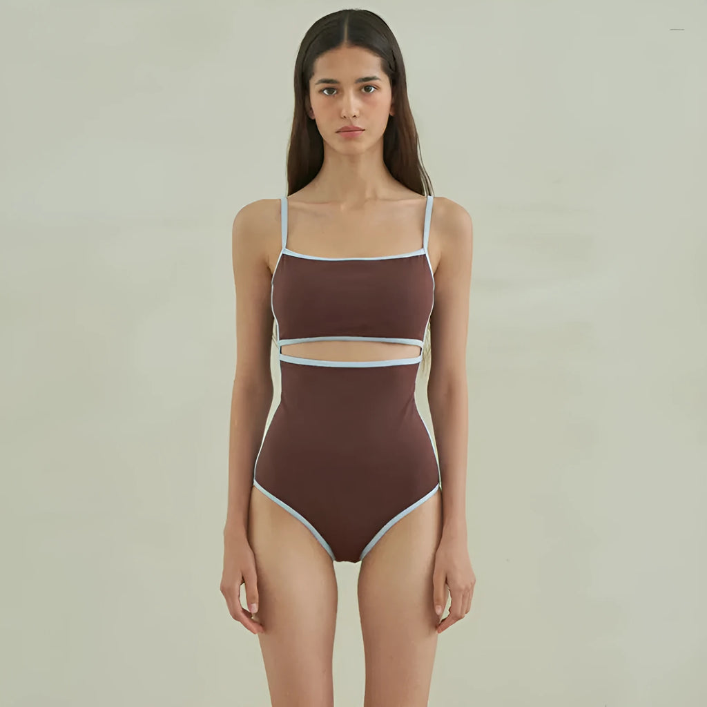 Brown women's one-piece swimsuit with a triangle top on a mannequin