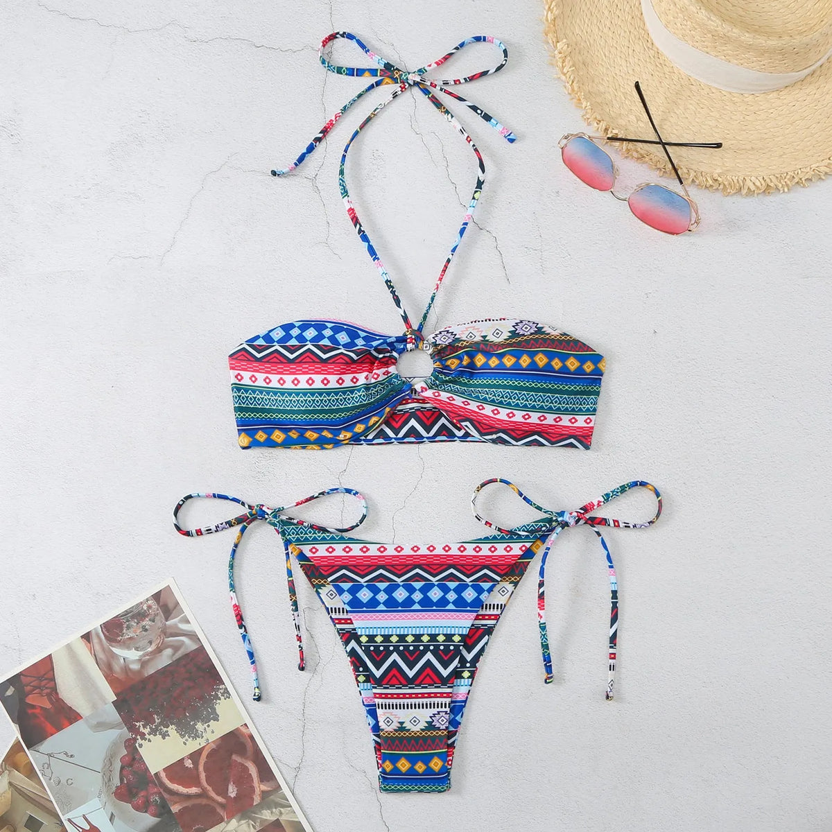 Women's green stripe grid halter neck bikini swimsuit set with briefs style bottom on a mannequin.