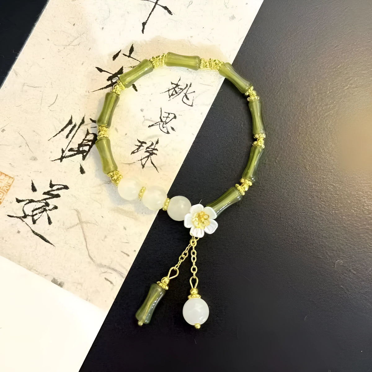 Handmade resin bracelet with lily of the valley floral design, lightweight women's jewellery