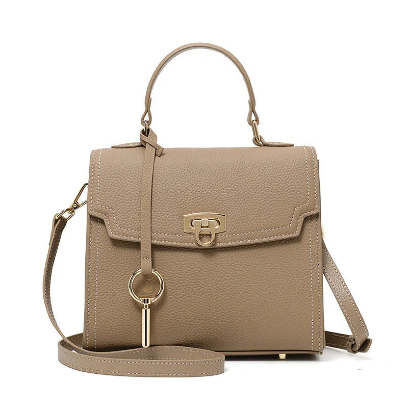 Elephant grey vintage leather handbag with litchi pattern and lock design