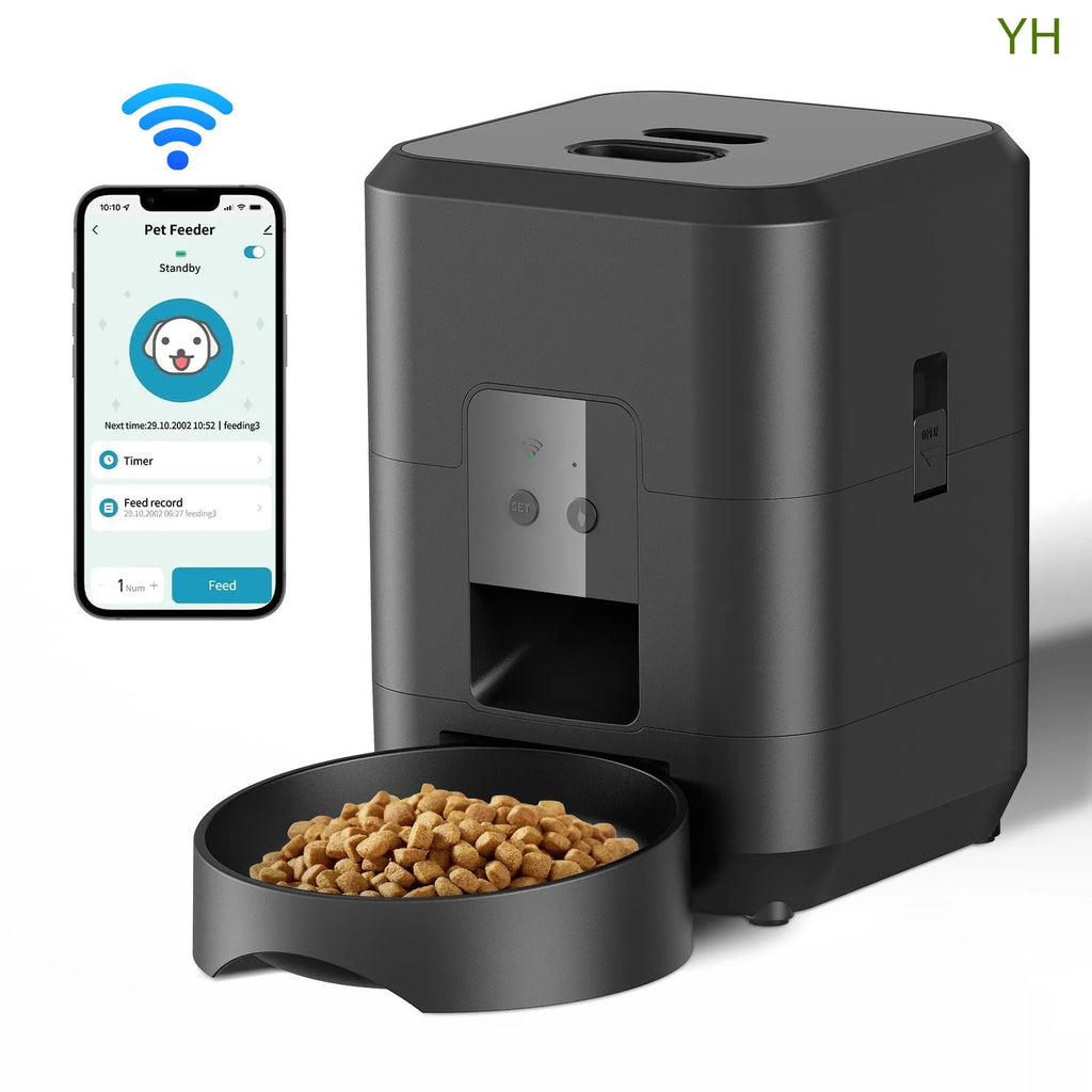 White automatic cat feeder with smartphone showing remote control interface and scheduled feeding times