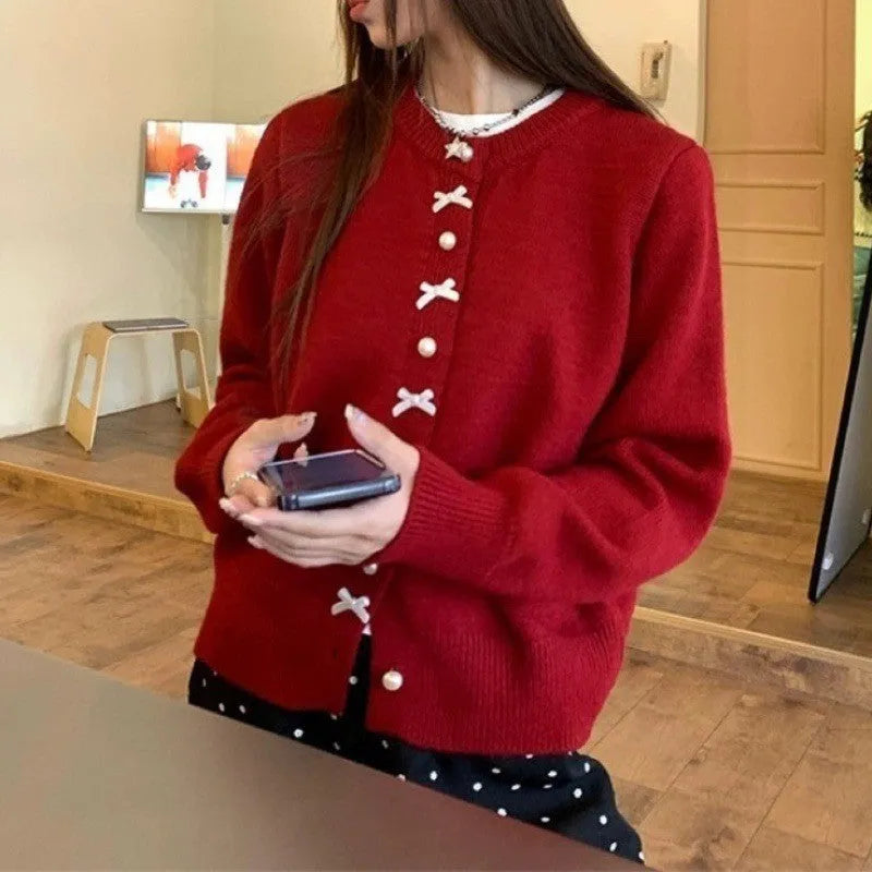 Women's cashmere acrylic cardigan with bow decoration and pearl buttons in various colours