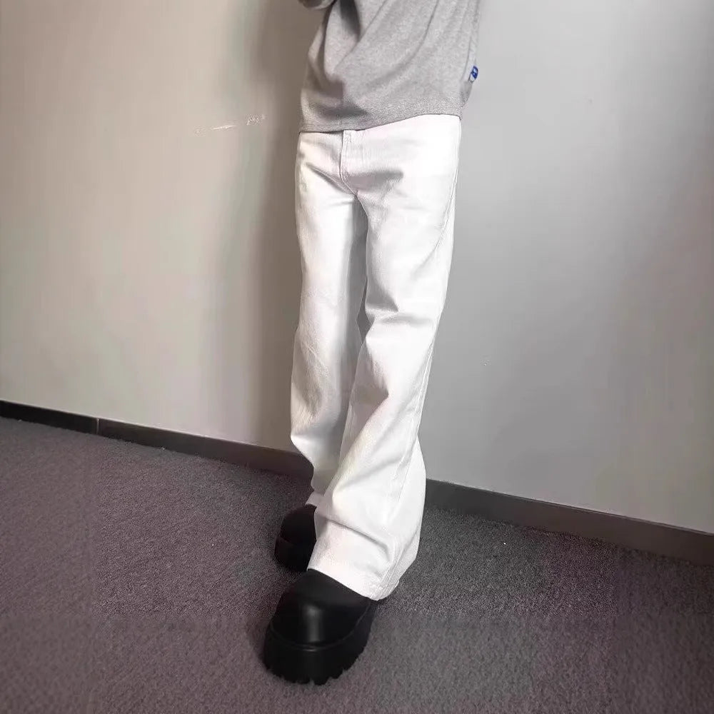 Men's white straight-leg wide-cut denim jeans on a plain background, showing front and side views.