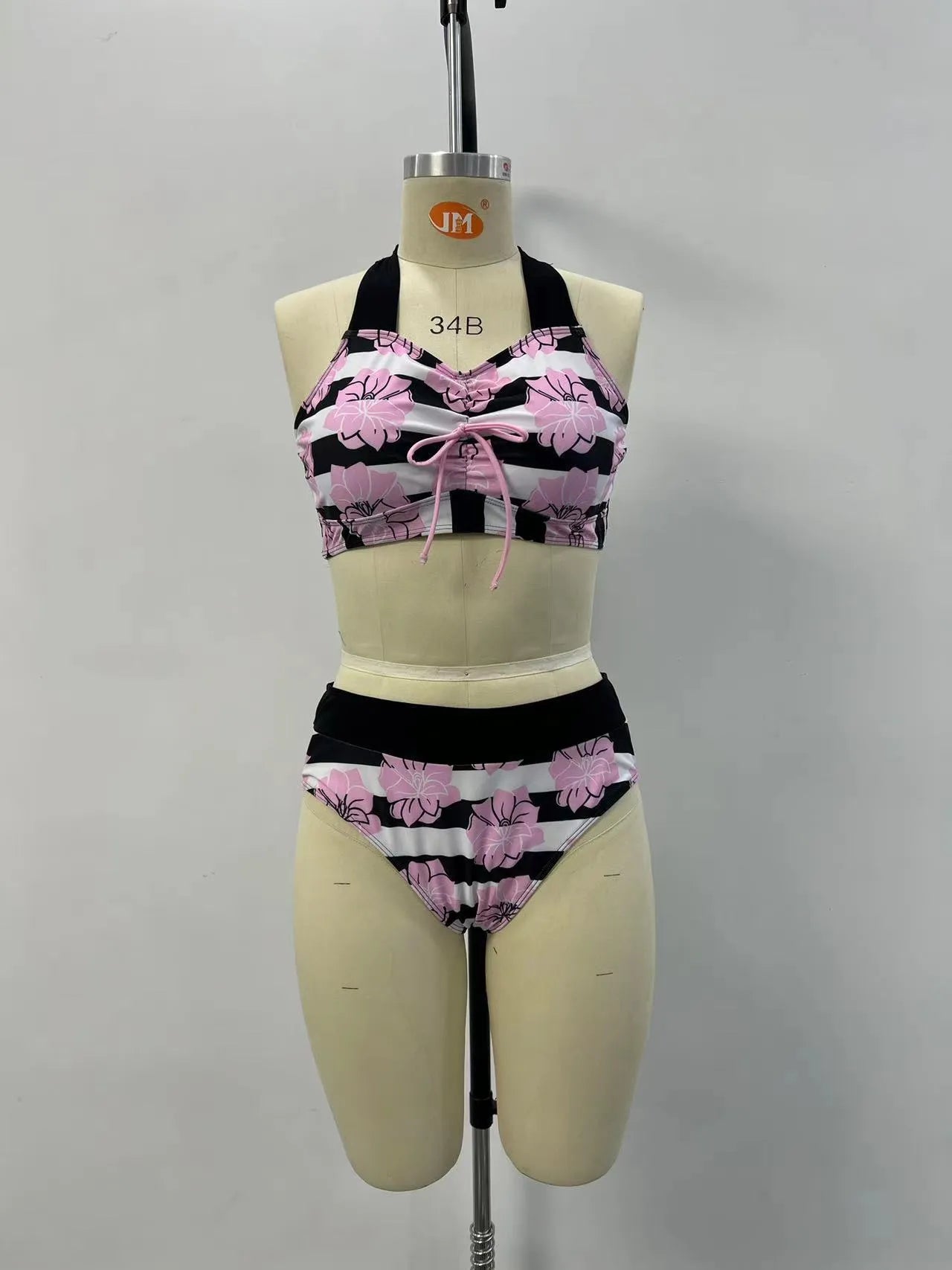 Black printed women's bikini swimsuit with belly covered slimming design.
