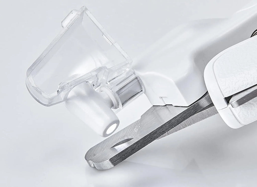 White LED pet nail clipper with transparent anti-splash guard and nail file.