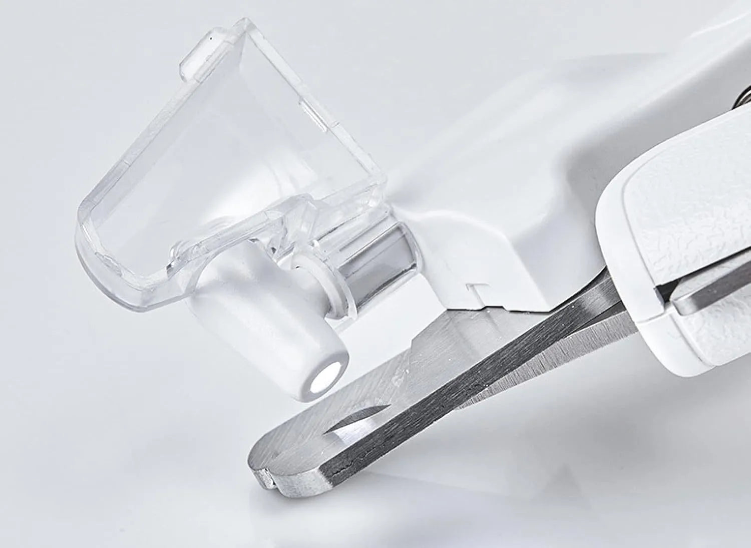 White LED pet nail clipper with transparent anti-splash guard and nail file.