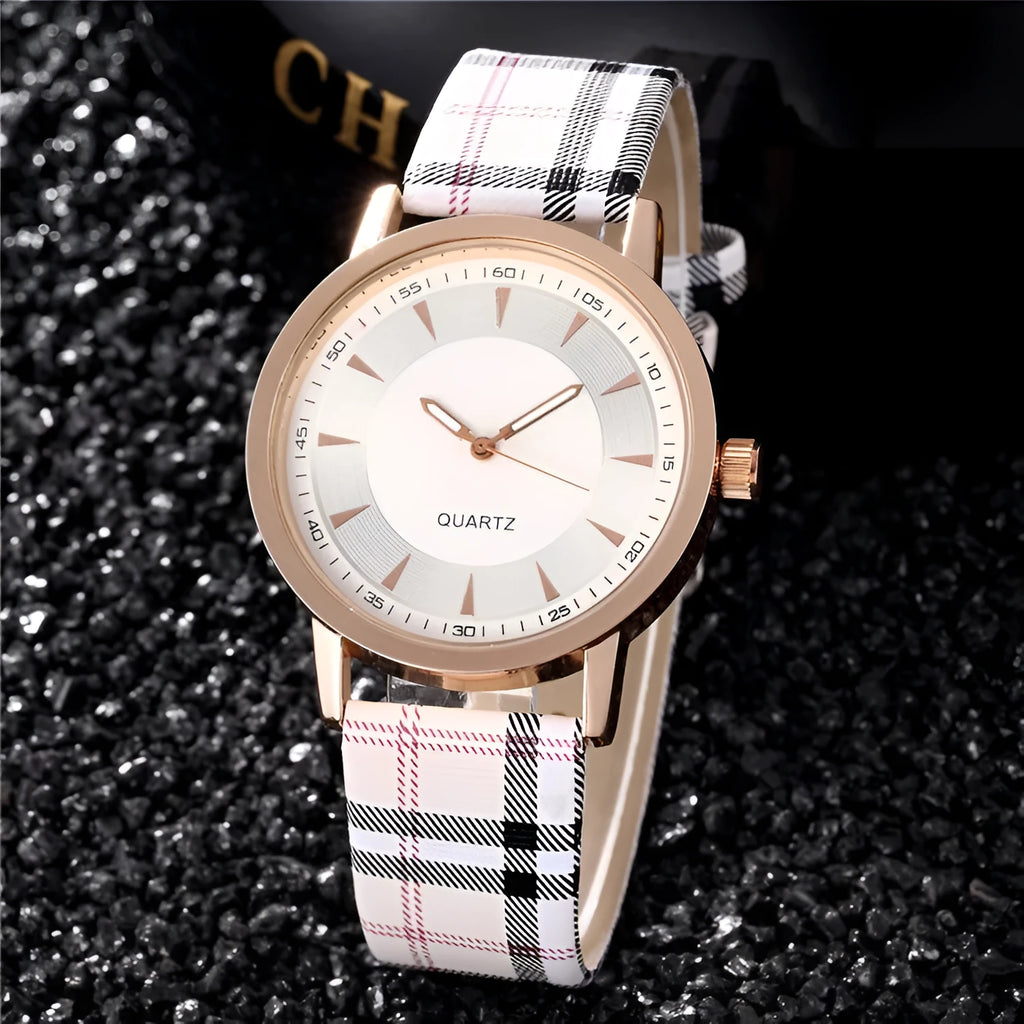 Gold black women's leather strap quartz watch with round 32mm dial and slim 6mm case