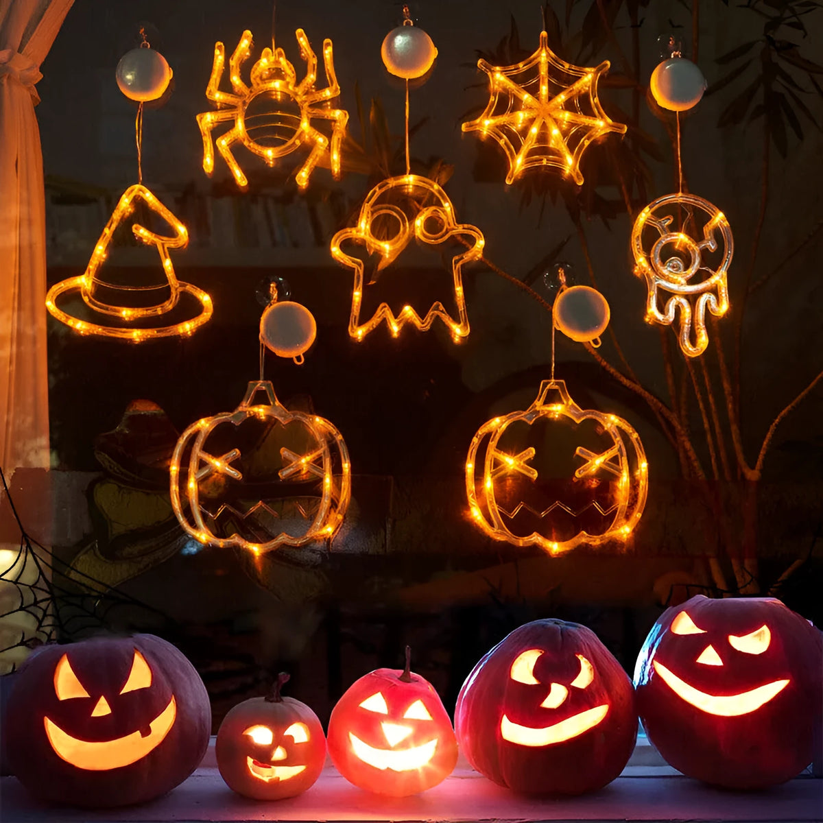 Halloween LED window lights showing spider, pumpkin and ghost designs with suction cup mounting