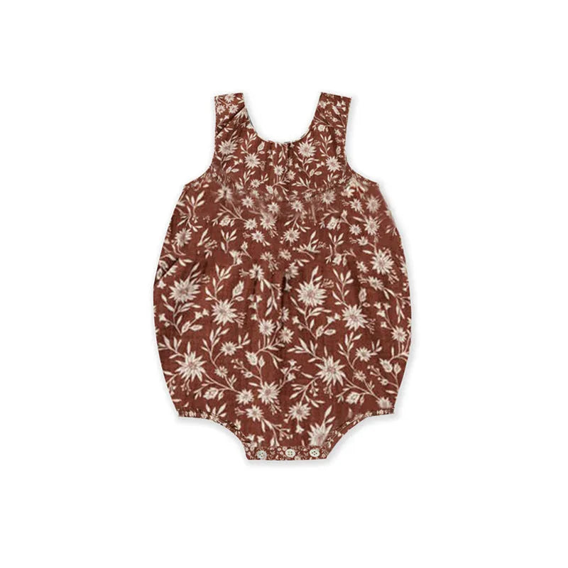 Cotton sleeveless baby romper in floral pattern, triangle jumpsuit style, shown in beige leaves colour, sizes 66cm to 90cm