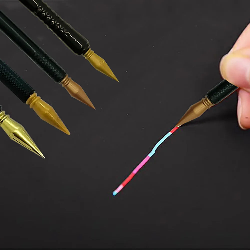 A white scratch art pen with a black brush tip on a wooden surface.