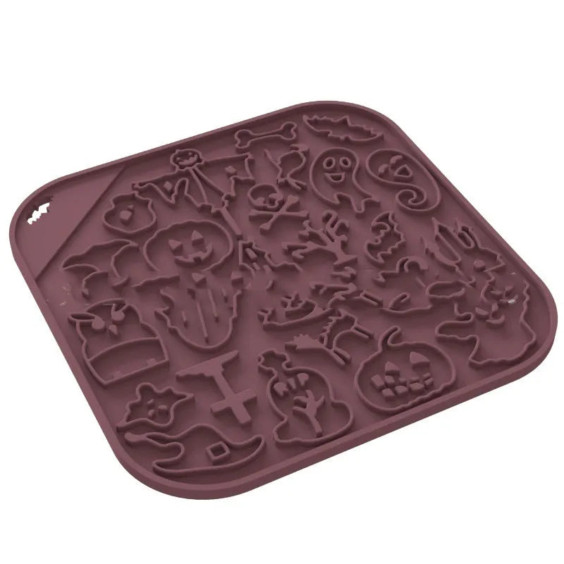 Edible silicon anti-choke slow feeding dog bowl in Halloween orange colour on floor
