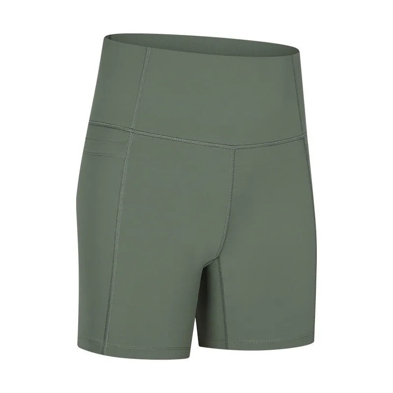 Woman wearing solid colour super stretch cotton blend sports shorts for running.