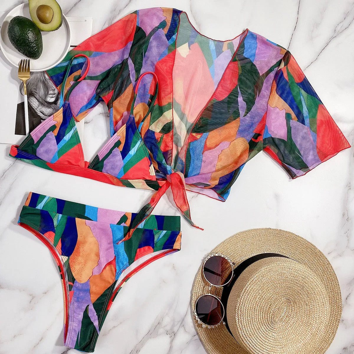 Red printed nylon split swimsuit for women, shown in a briefs-style bikini cut.