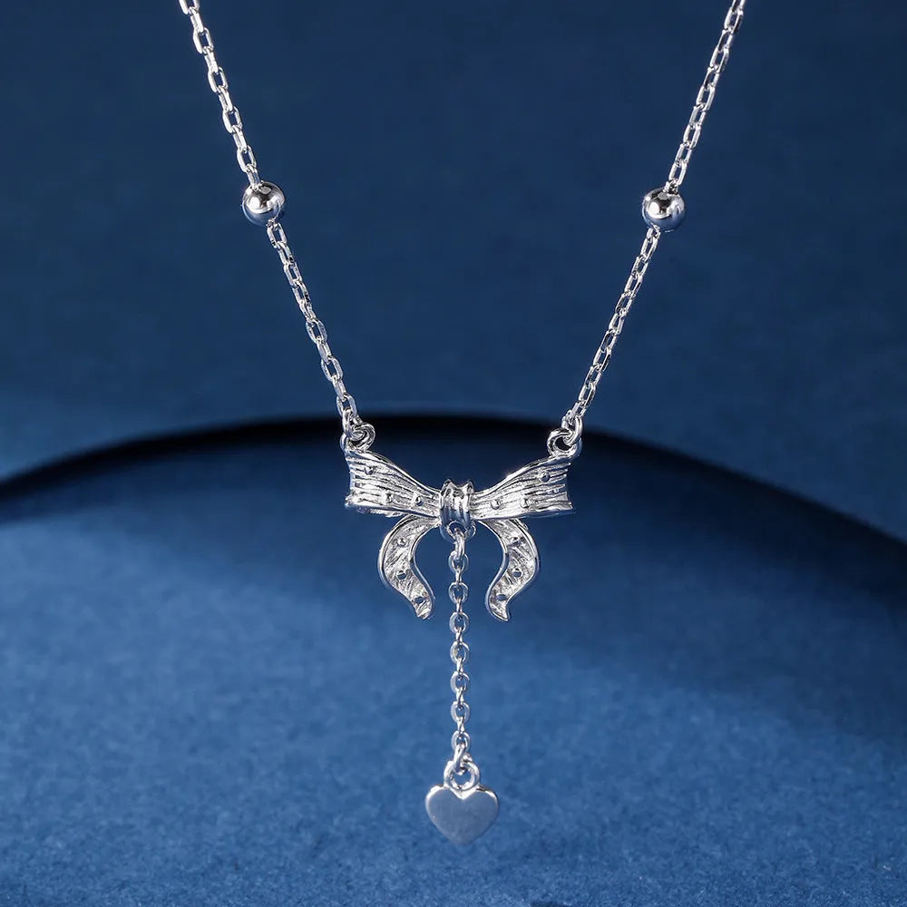 S925 silver heart butterfly clavicle chain necklace with bow pendant