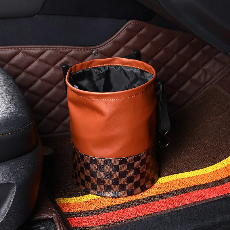 Leather retractable interior car bin with handle, shown in vehicle cabin setting