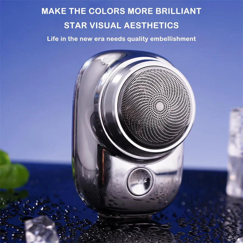 Mini portable USB electric shaver in silver with rotary head, aluminium body, and IPX7 wet and dry use