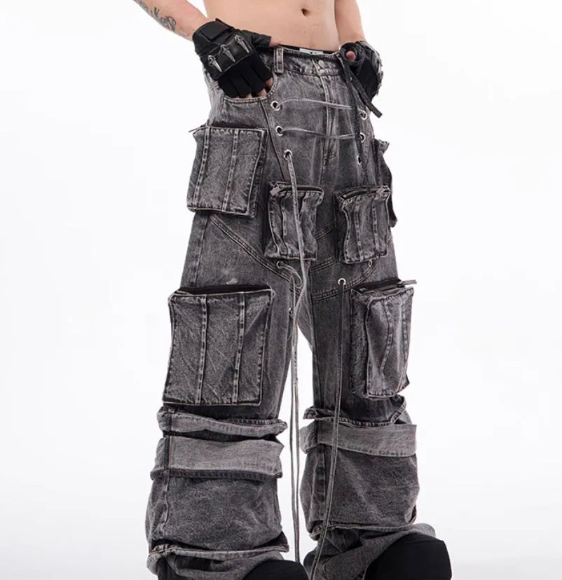 Grey distressed denim overalls with rope stitching detailing in American-style design